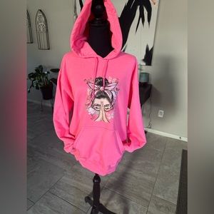 Praying women pink sweater